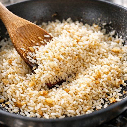 Step 4: Add Rice and Toast It Briefly